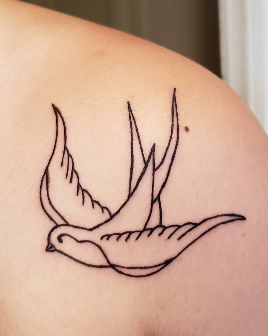 Traditional Bird Tattoo