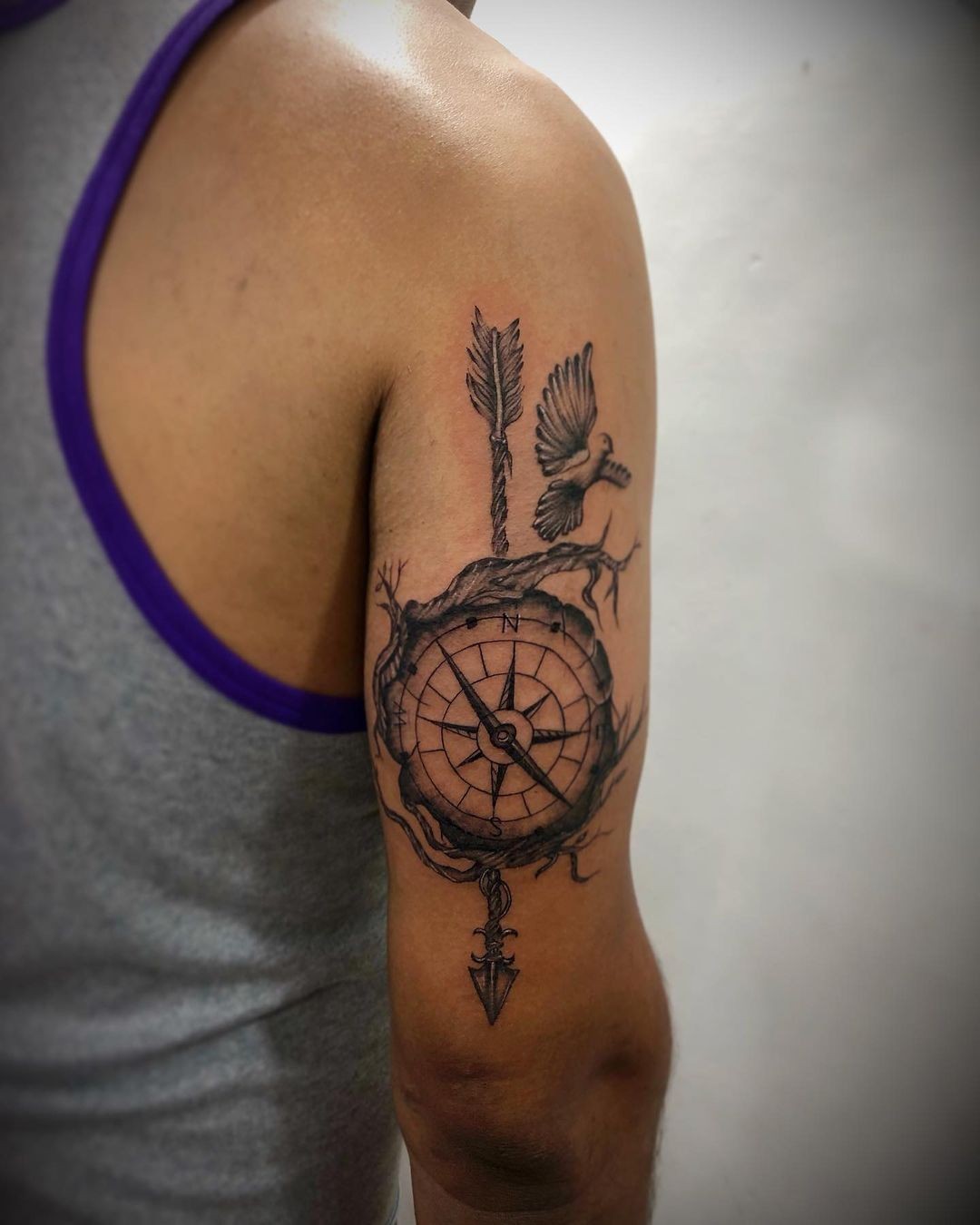 Arrow Compass Tattoo On Forearm