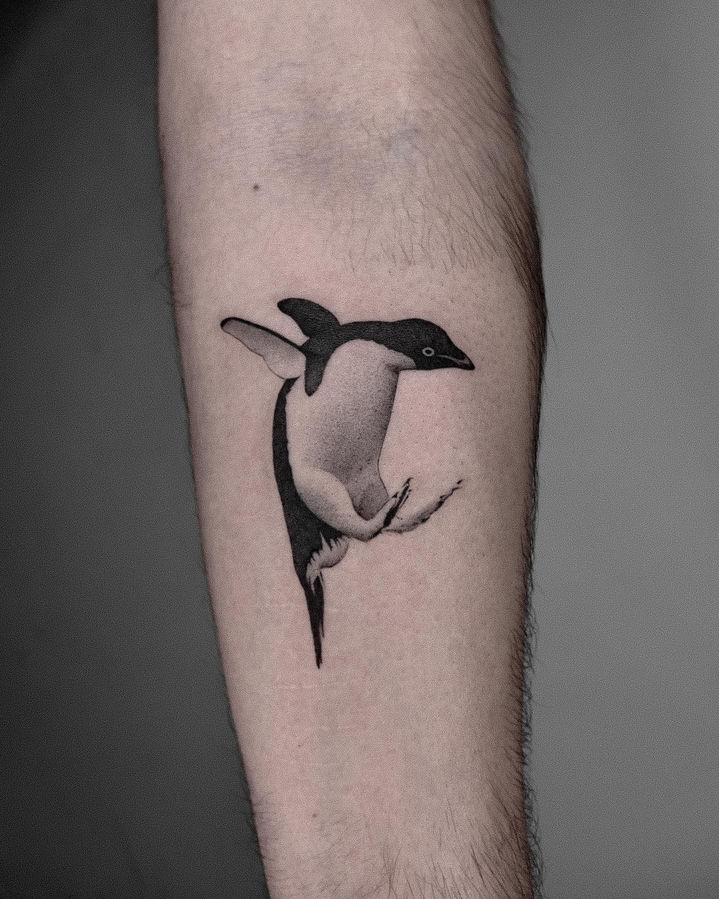 Baby Penguin Tattoo In A Flying Mood