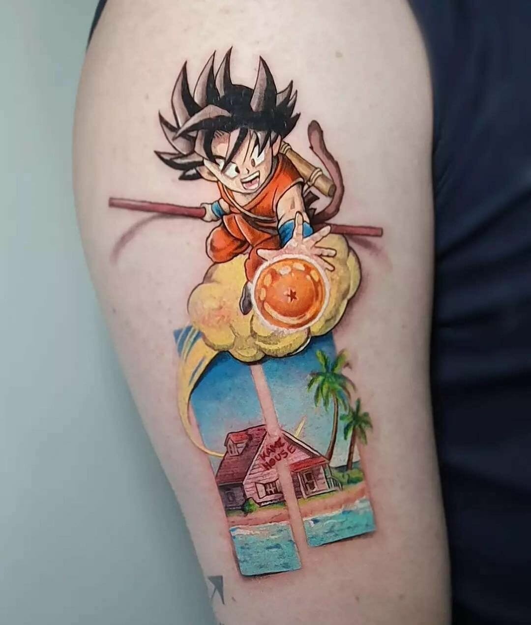 Awesome Goku Tattoo with Kame House In The Background