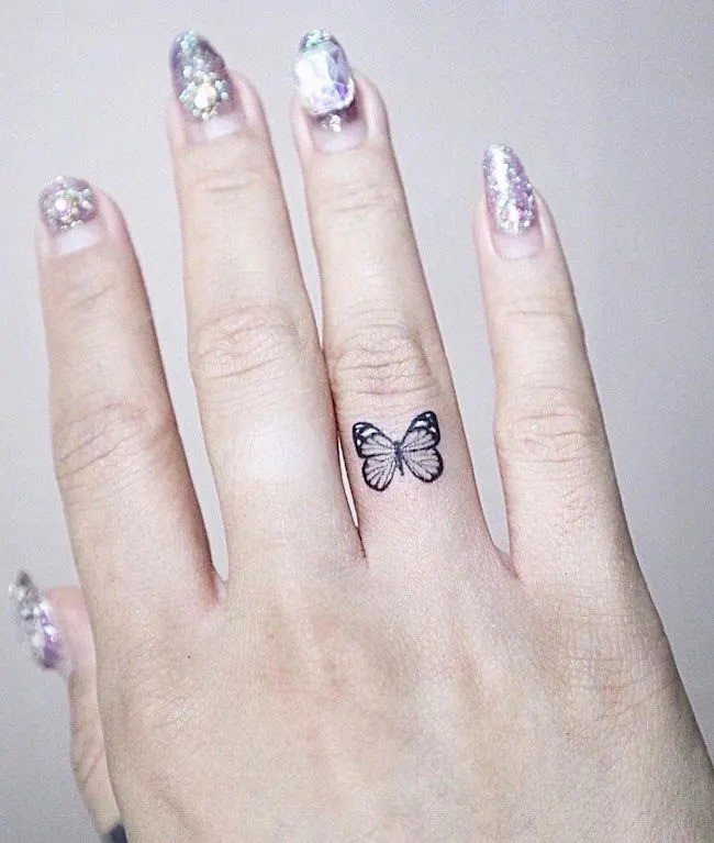 Finger Dot Tattoo