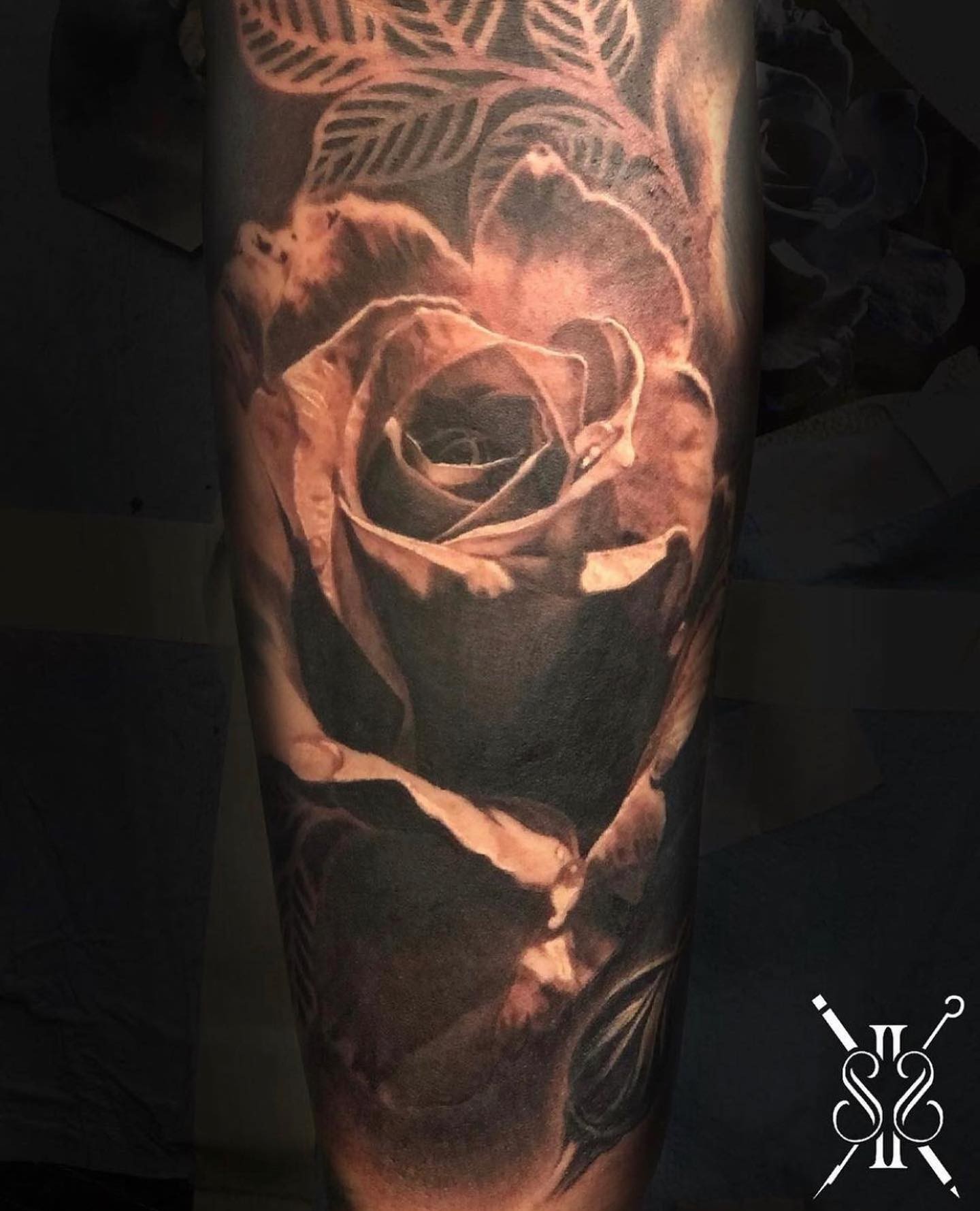 A Rose Flower Tattoo With Intricate Shading