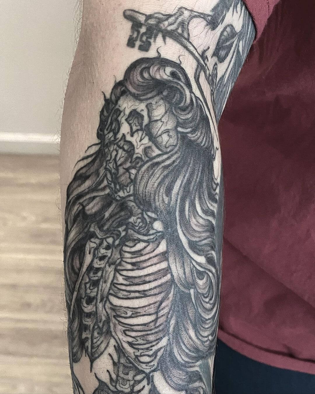 Mermaid Skeleton Tattoo