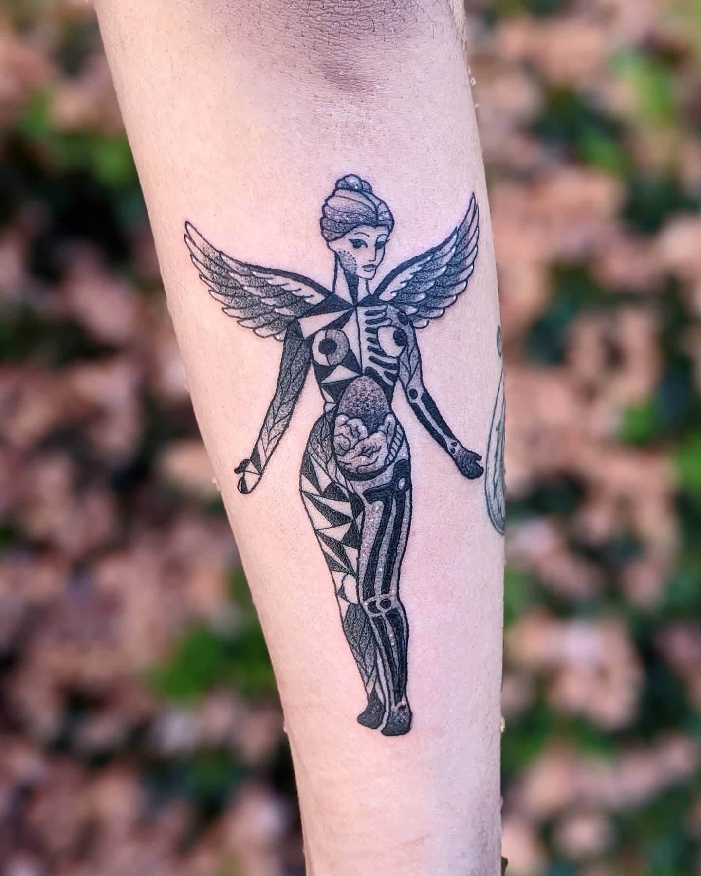 In Utero Geometric Tattoo