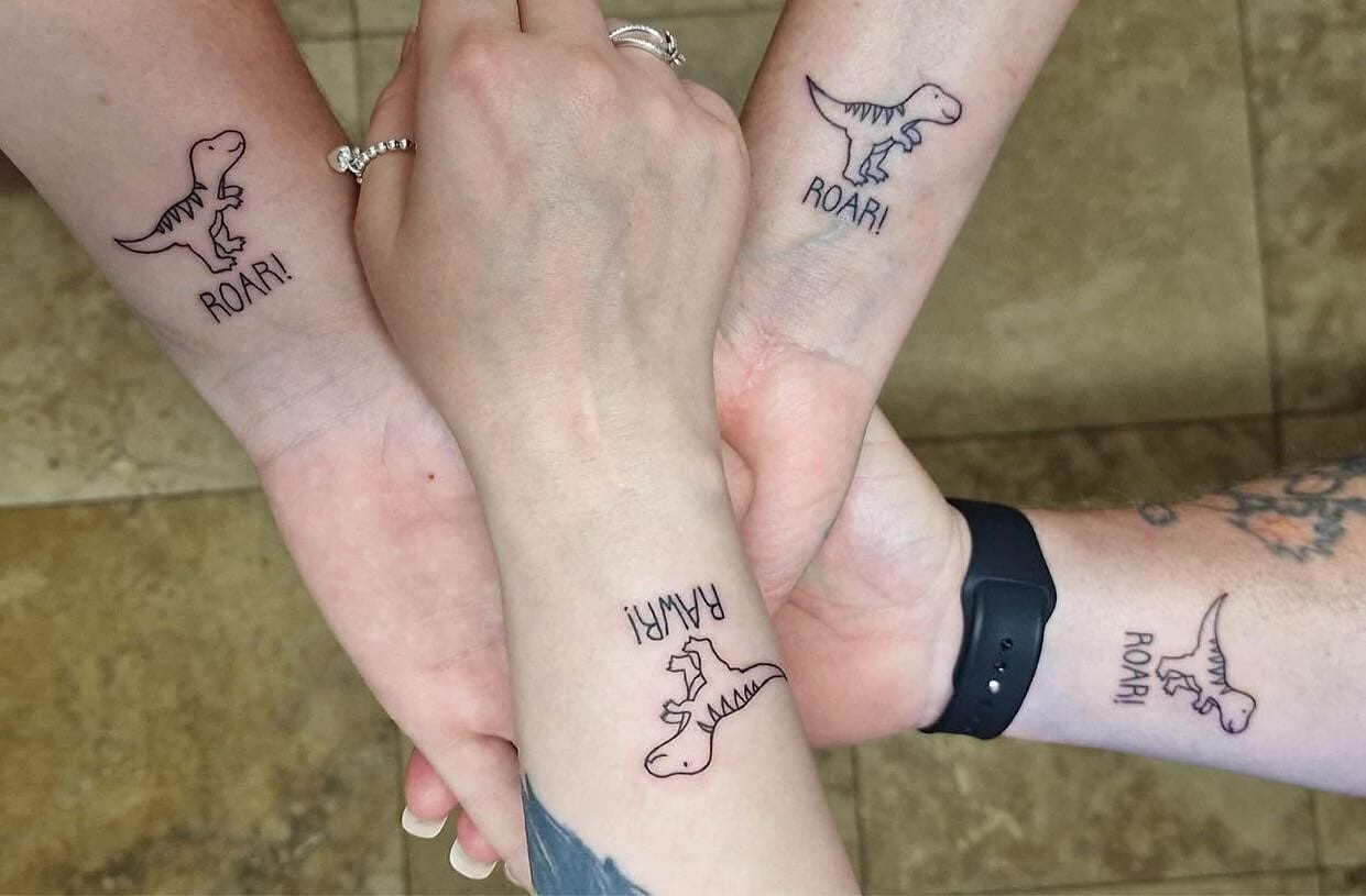 Friendship Symbol Dino tattoo