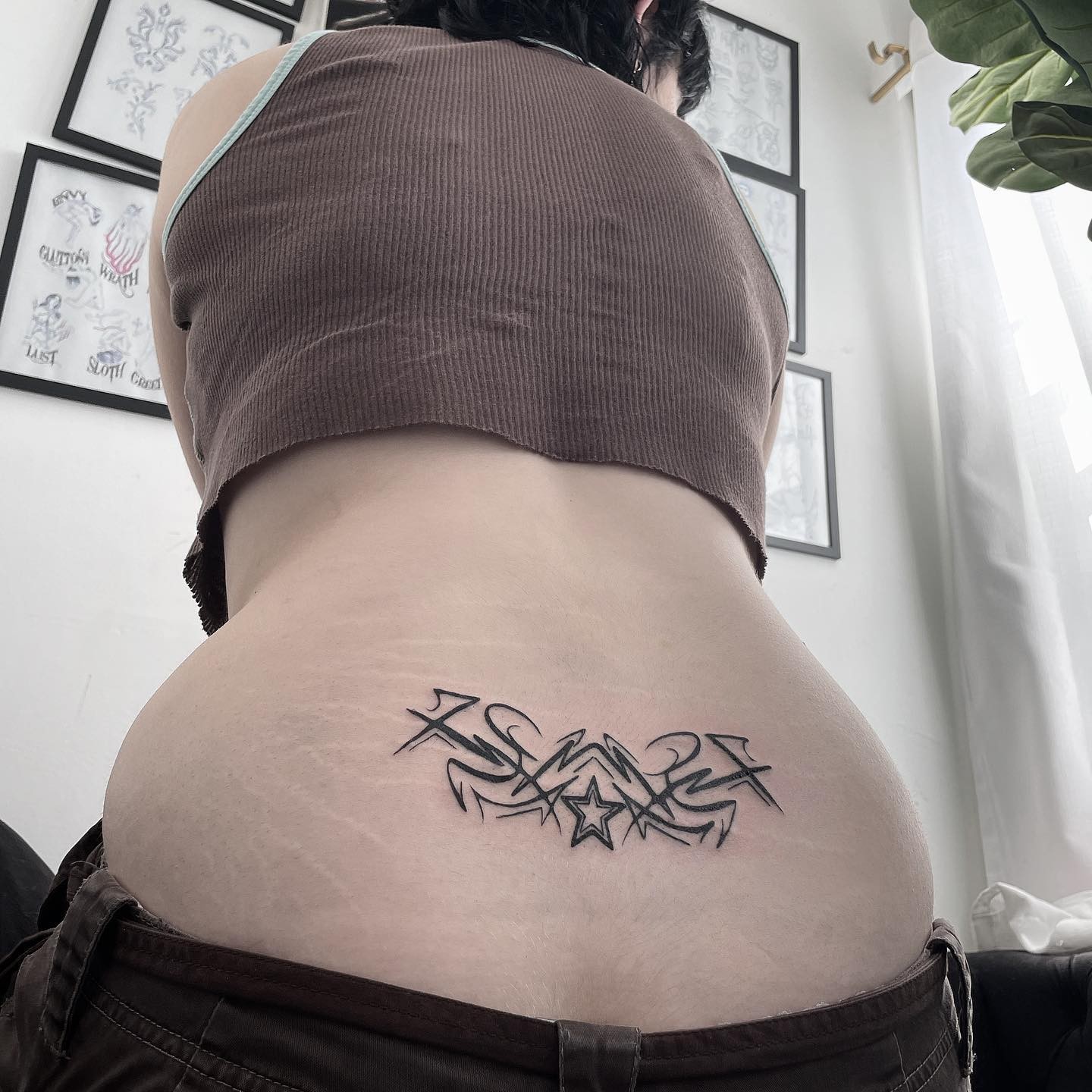 Star Lower Back Tattoo