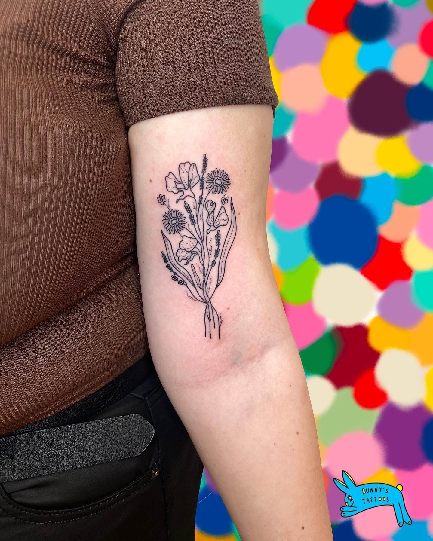 Black Ink April Birth Flower Tattoo