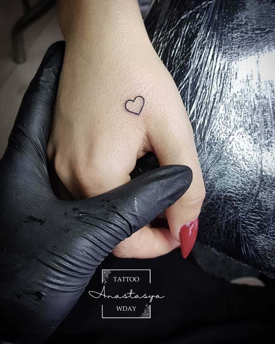 Small Heart Hand Tattoo