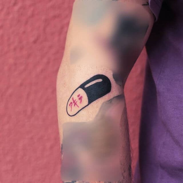 Akira Pill Tattoo