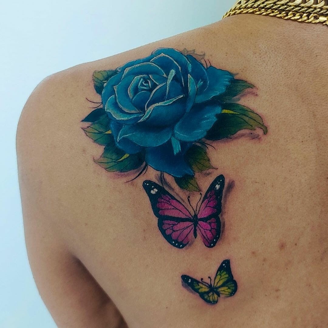 Butterflies And Realistic Blue Rose Tattoo