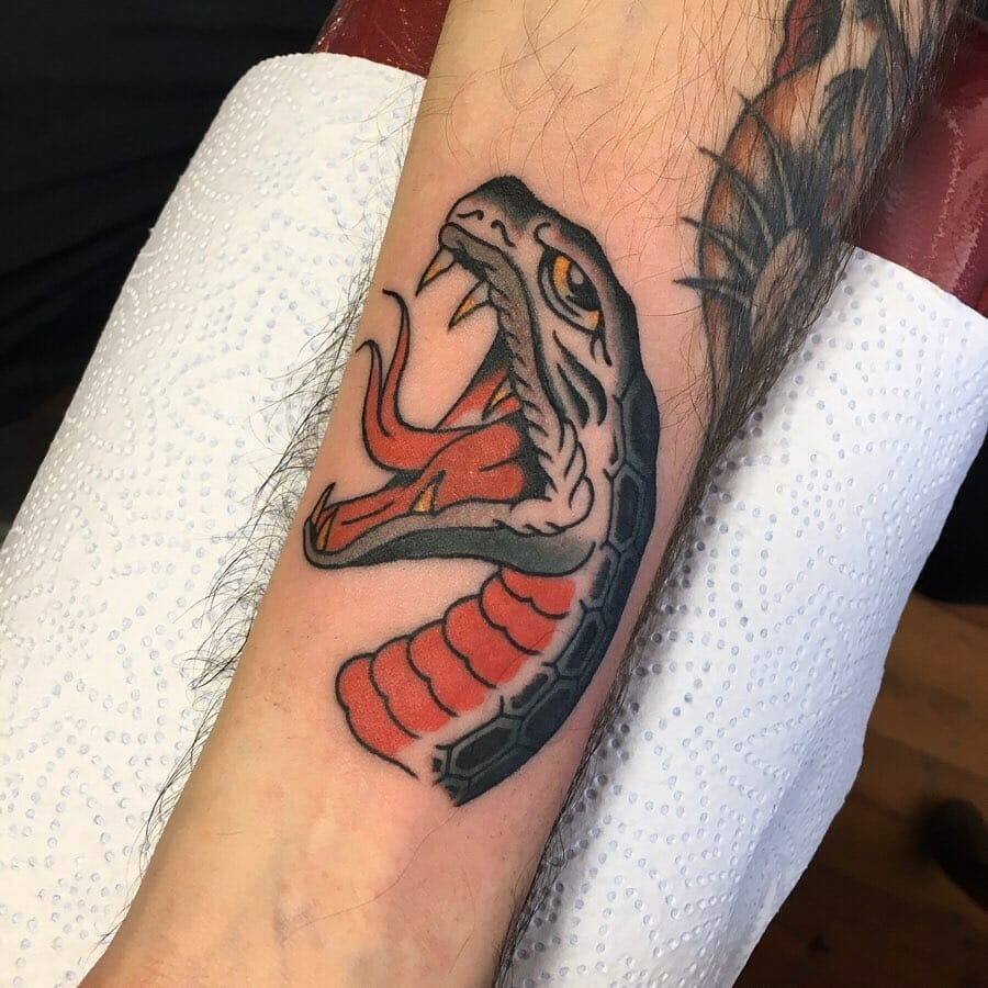 Black Cobra Tattoo On Arm