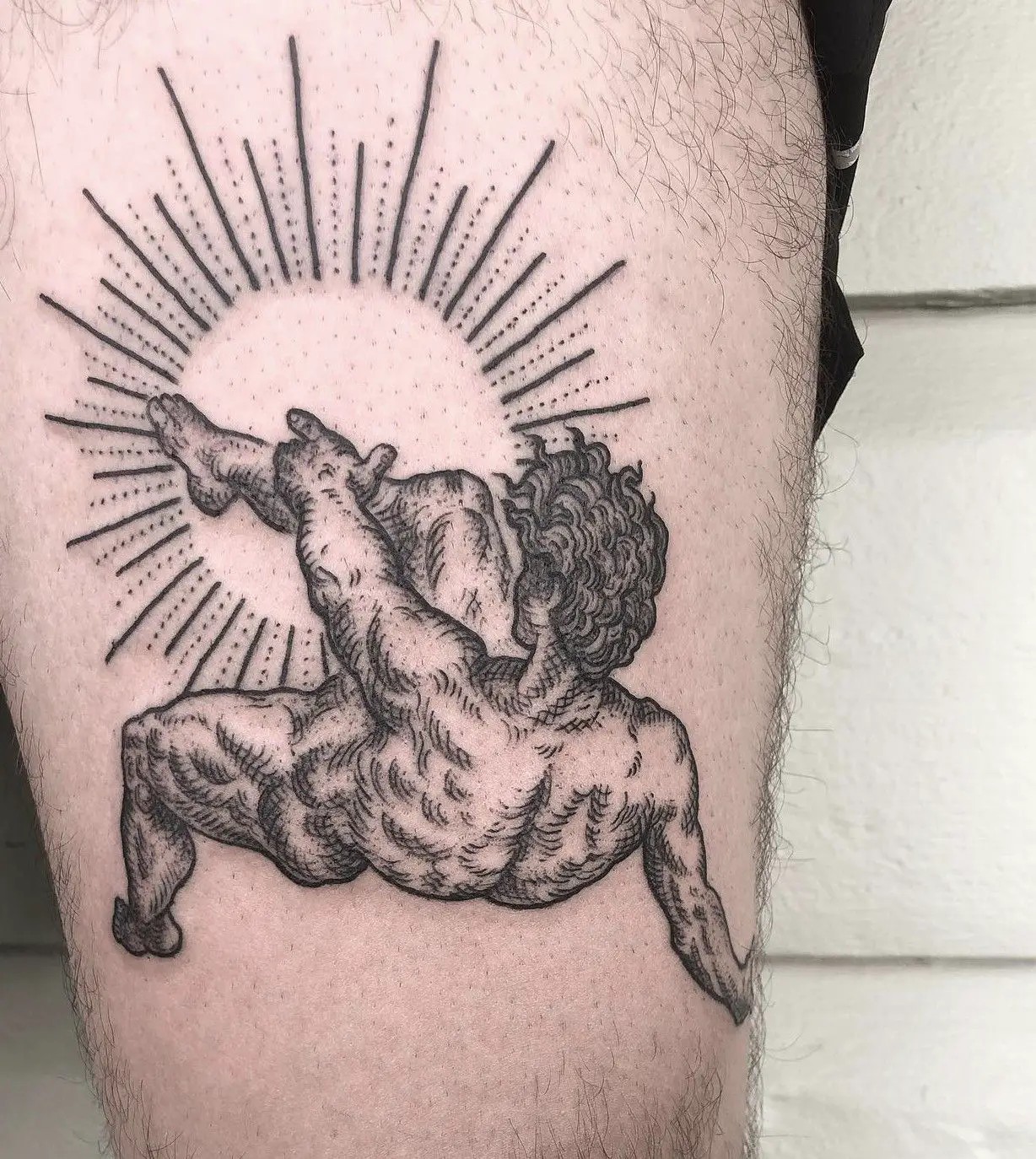 A Complex Graphic Icarus Tattoo