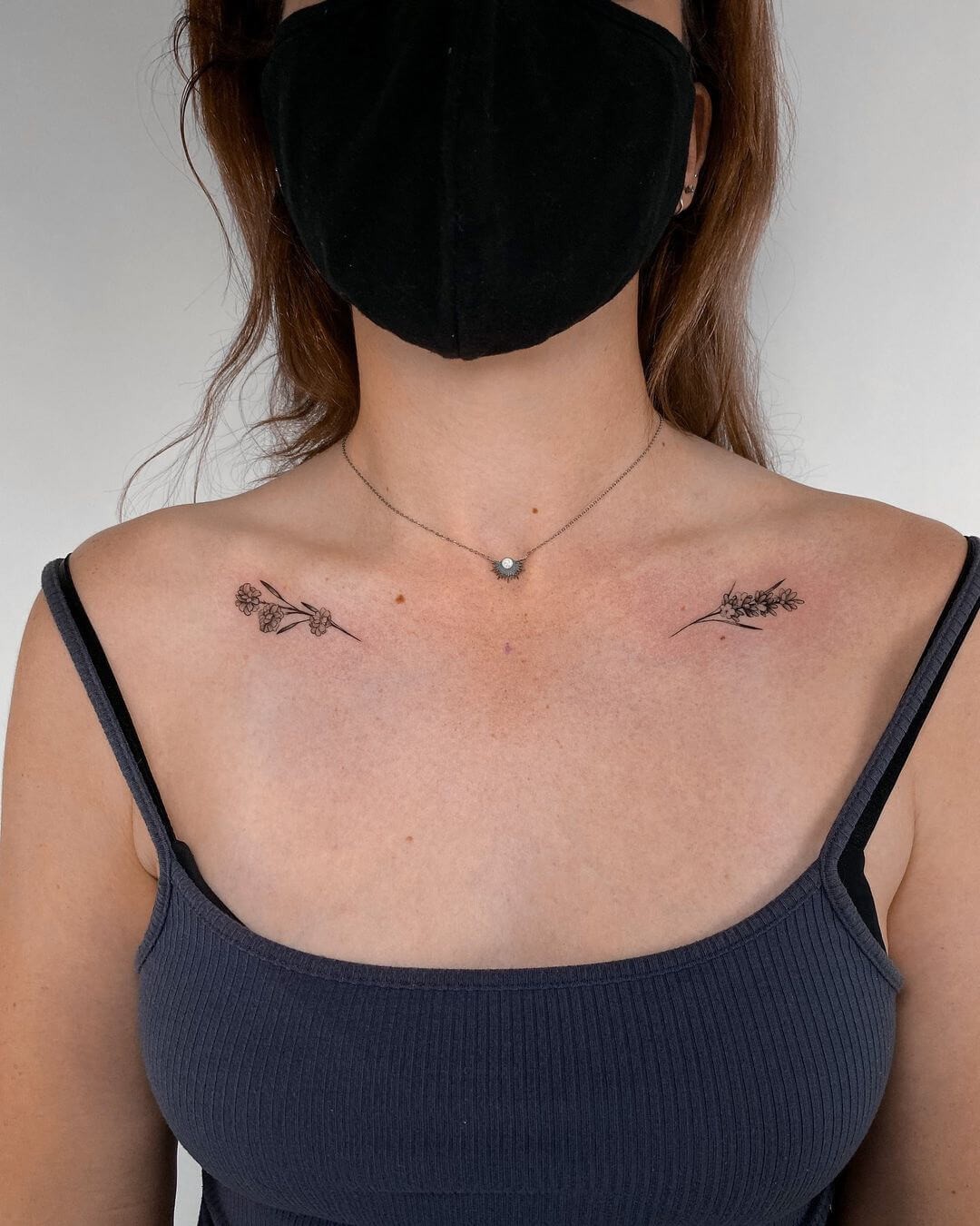 Dainty Collar Bone Tattoo With Flowers