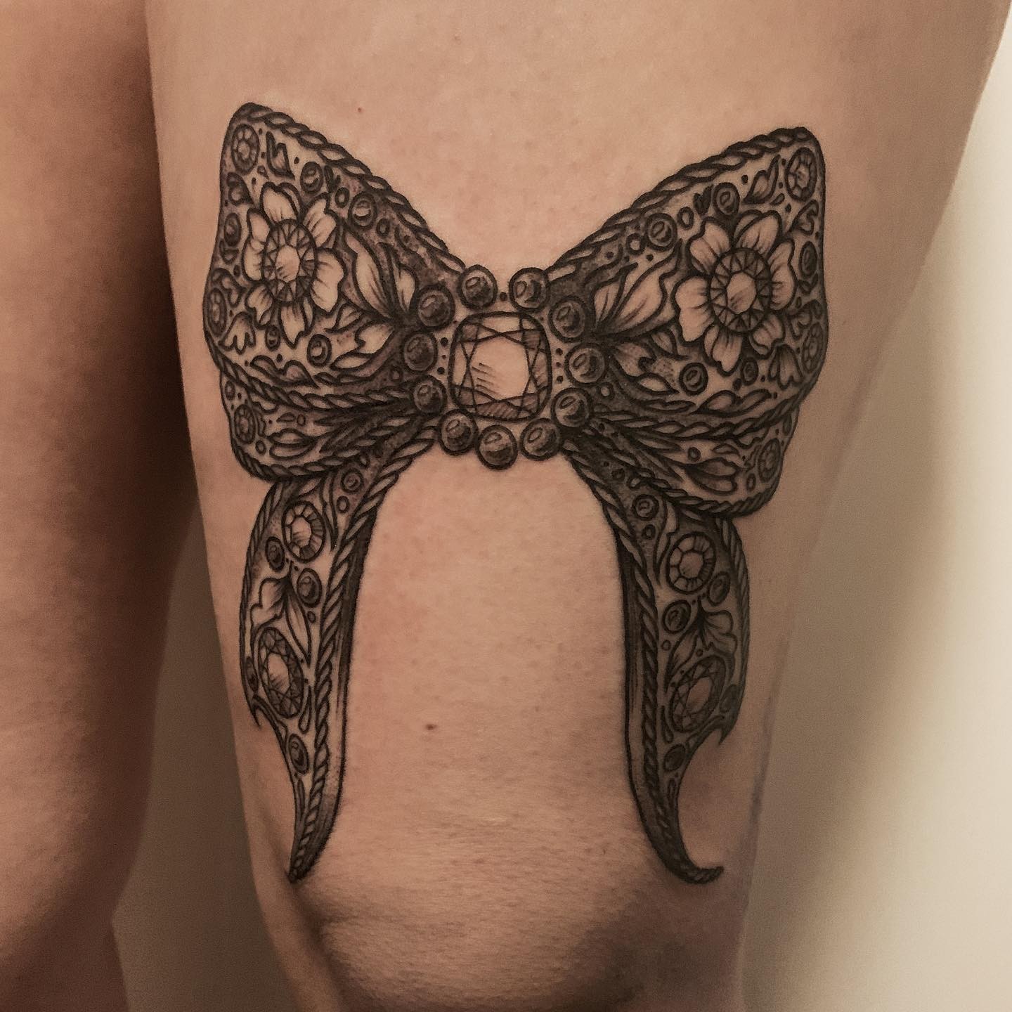 Lacy Thigh Bow Tattoo