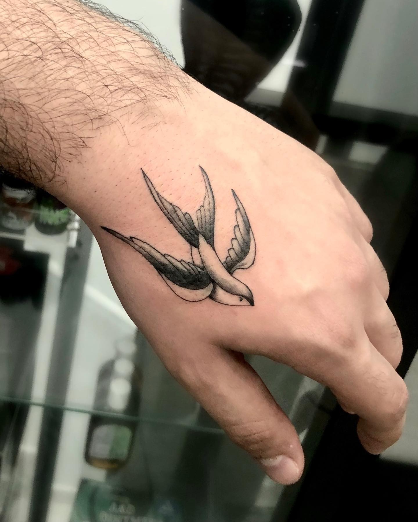 Bird Hand Tattoos