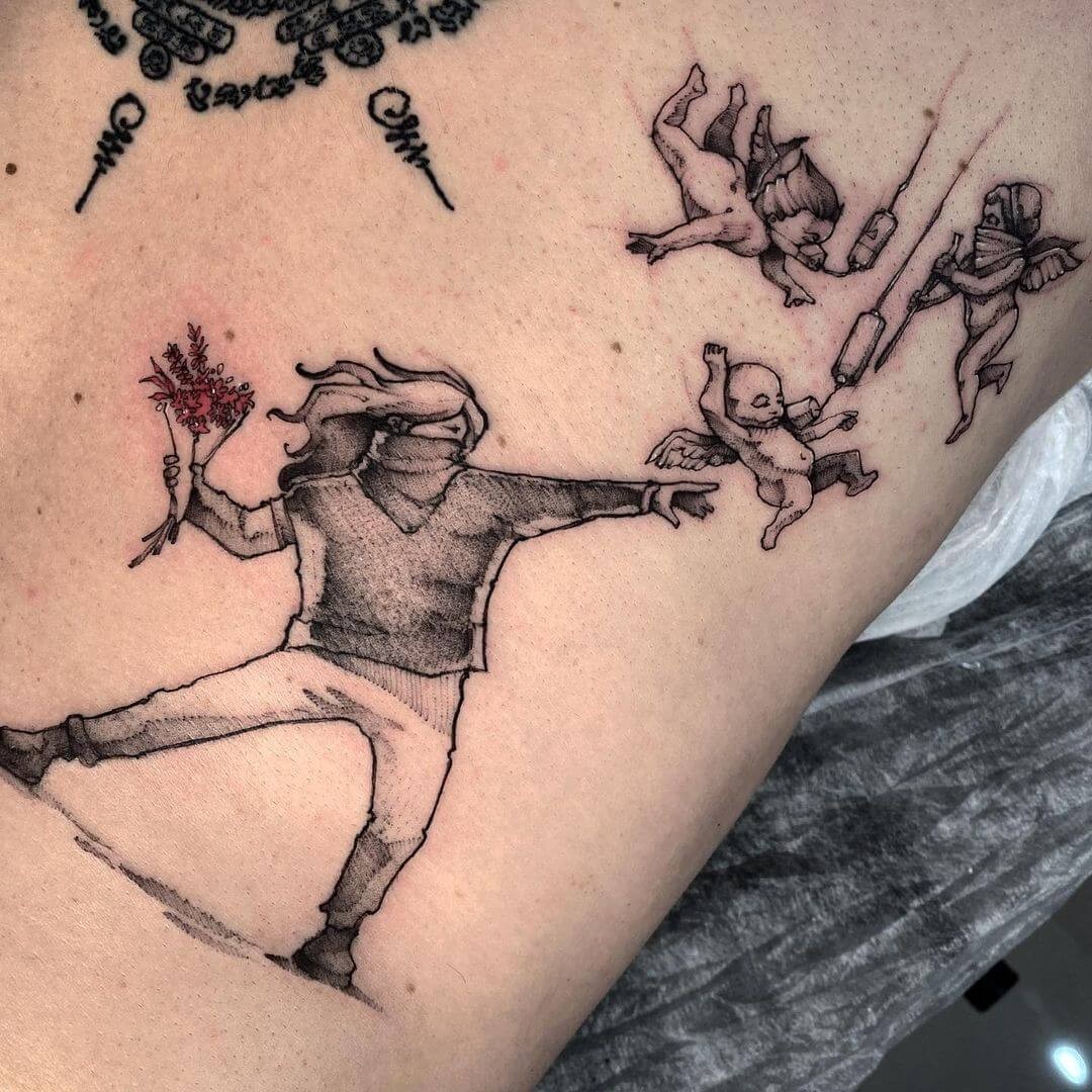 Throwing Flowers Banksy Tattoo