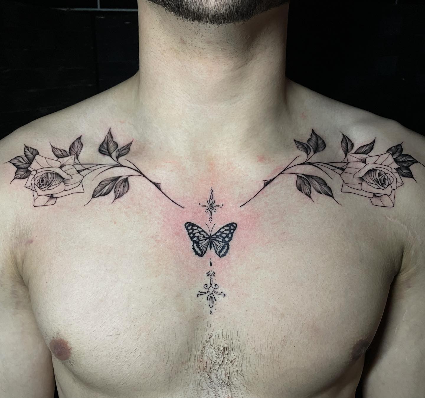 Black Inked Rose Collarbone Tattoo